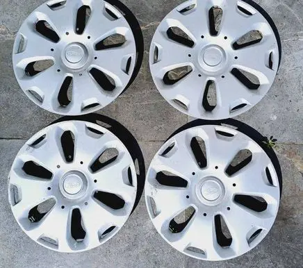 Ford Fiesta R14 wheel hub/cap/trim 8V211130EA