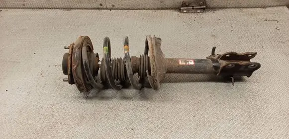Nissan X-Trail T30 Front shock absorber with coil spring 