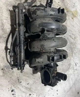 Volkswagen Polo III 6N 6N2 6NF Intake manifold 036129711