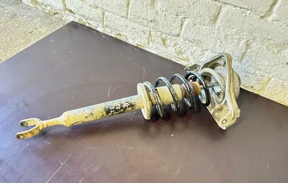 Audi A6 S6 C6 4F Front shock absorber with coil spring