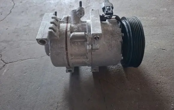 KIA Sportage Air conditioning (A/C) compressor (pump) 97701D7600 CA500NFJAA03