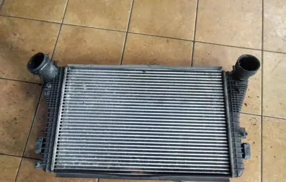 Volkswagen Golf V Intercooler radiator 1K0145803