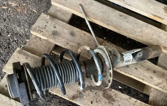 Front shock absorber with coil spring