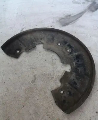 Volkswagen Touareg I Front brake disc dust cover plate 7L0615311