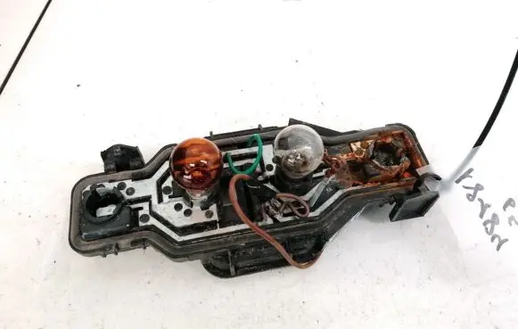 Subaru Legacy Tail light bulb cover holder