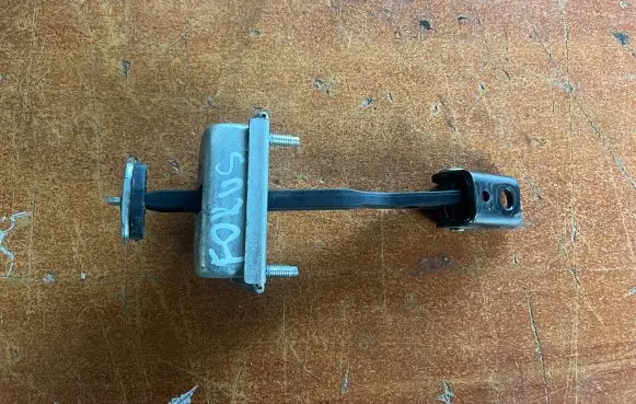 Ford Focus Rear door check strap stopper