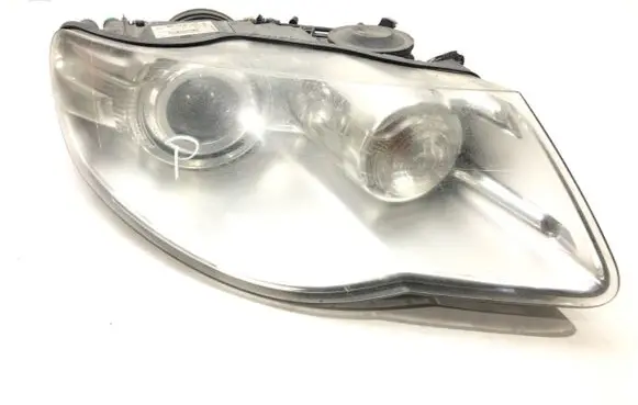 Volkswagen Touareg I Headlight/headlamp 7L6941032C