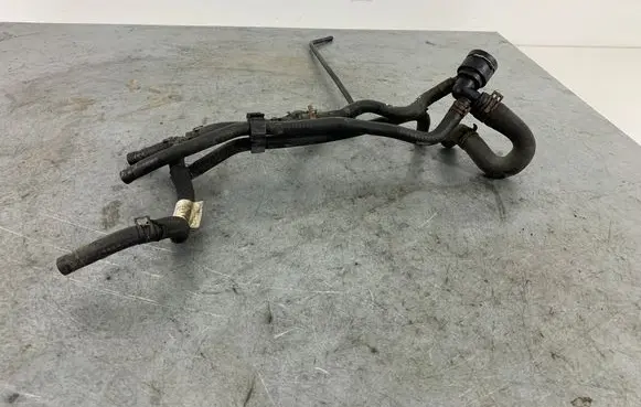 Volkswagen Golf VII Engine coolant pipe/hose 5Q0122101H