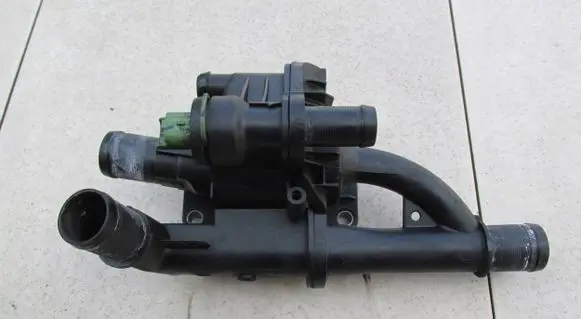 Thermostat/thermostat housing