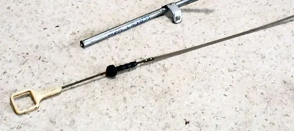 Oil level dip stick
