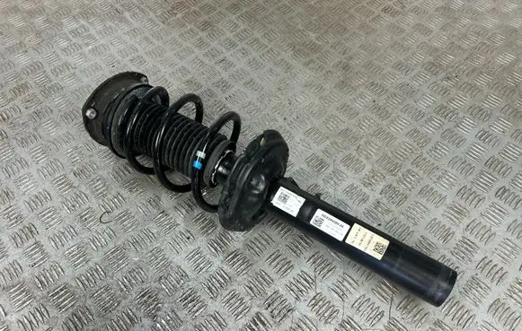 Volkswagen Golf VIII Front shock absorber with coil spring 5WA413031CA
