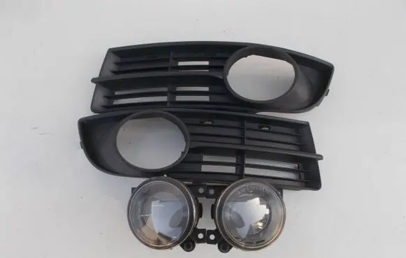 Volkswagen Touran I Front bumper lower grill 1T0853666A 1T0853665A