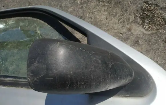 Mazda 121 SM Front door electric wing mirror