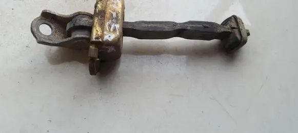 Nissan Almera Rear door check strap stopper