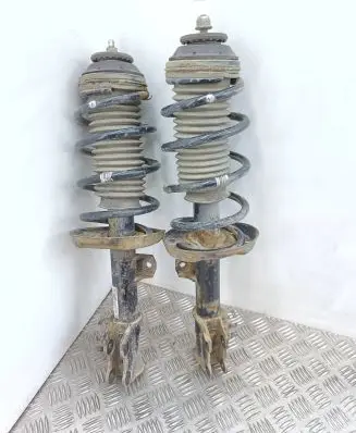 Opel Corsa D Front shock absorber/damper 13214357