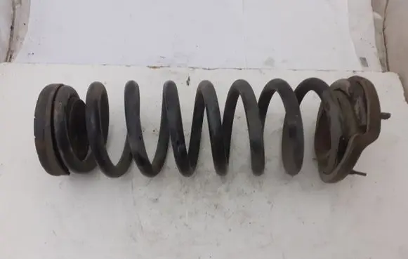 KIA Carens III Rear coil spring 546301D600