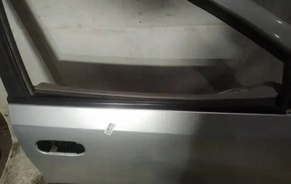 Nissan Almera Tino Front door glass trim molding 