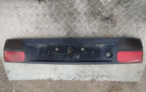 Renault Laguna I Trunk door license plate light bar 7700820049 7700820050 90831363