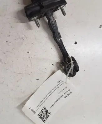 Front door check strap stopper