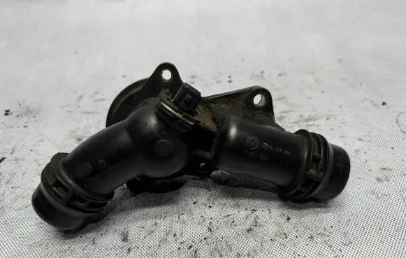 Thermostat/thermostat housing