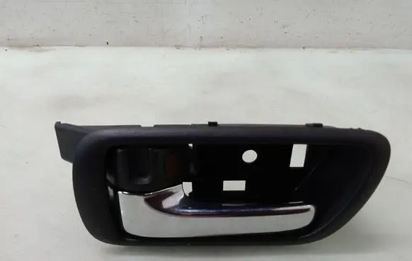 Toyota Corolla Verso E121 Front door interior handle
