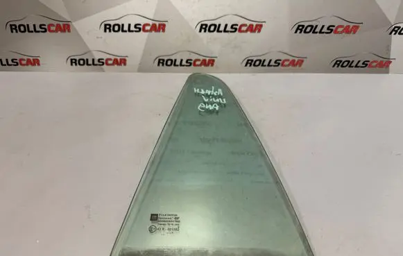 Opel Astra H Rear vent window glass 43R001582