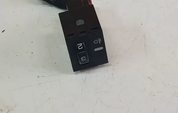 Headlight level height control switch