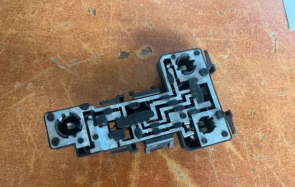Tail light bulb cover holder