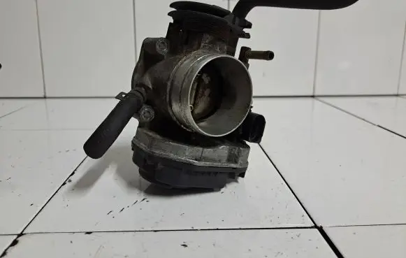 Volkswagen Golf IV Throttle valve 06A133064J 408237111012