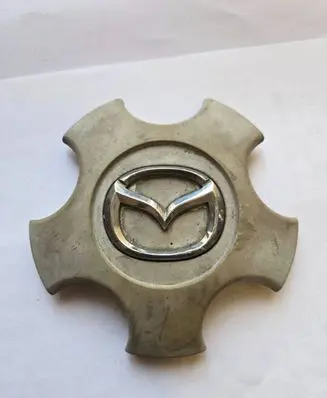 Mazda 323 F Non-original wheel cap 2876