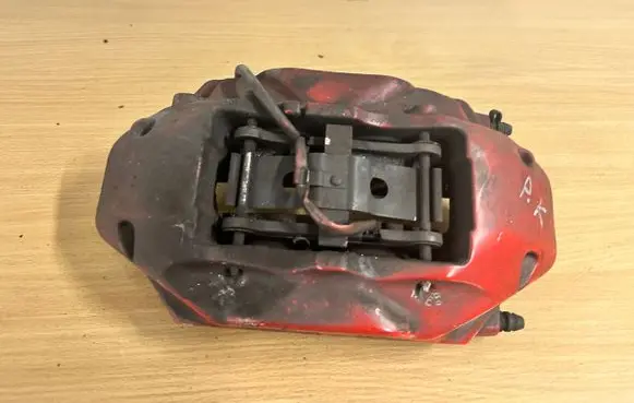 Volkswagen Touareg II Front brake caliper
