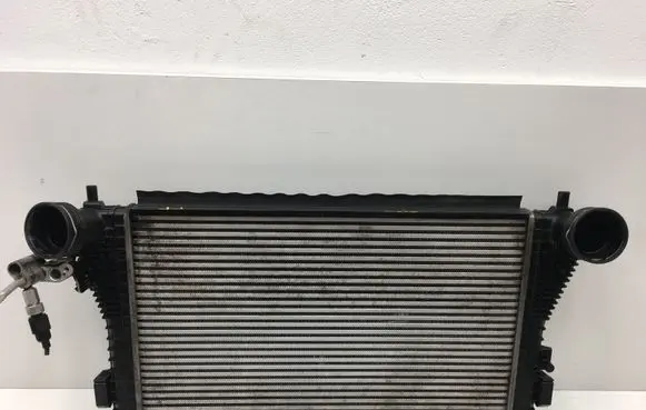 Volkswagen Golf V Intercooler radiator 1K0121345E