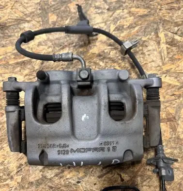 Jeep Grand Cherokee WL Front brake caliper 68338905AB
