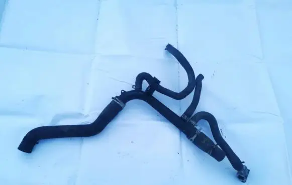 Opel Tigra A Engine coolant pipe/hose 1310327