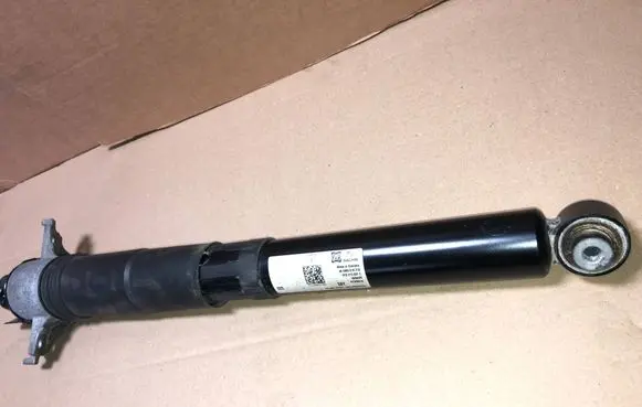 Porsche Cayenne (9Y0 9Y3) Rear shock absorber/damper 9Y0513031C HE3S051K