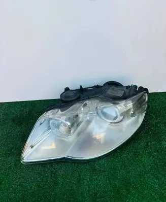 Volkswagen Touareg I Headlight/headlamp 7L6941031C