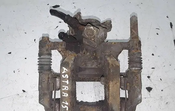 Opel Astra J Rear brake caliper