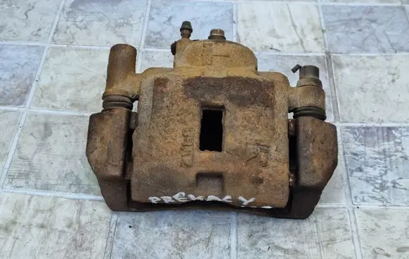 Mazda Premacy Front brake caliper