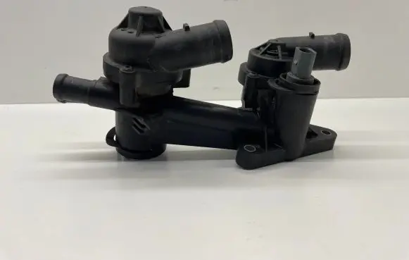 Volkswagen Golf VI Thermostat housing 03C121026AC