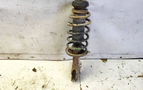 Volkswagen Golf III Front shock absorber with coil spring 1H0413031L 20K583