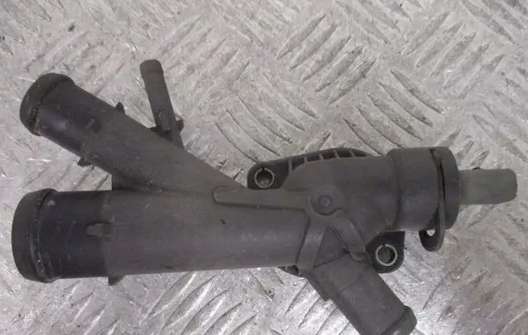 Skoda Rapid (120G, 130G, 135G) Thermostat housing 03L121131AA