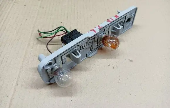 Nissan Micra Tail light bulb cover holder 89098574