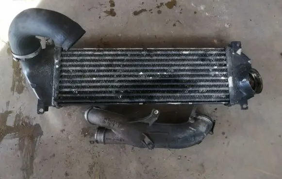 Mercedes-Benz ML W163 Intercooler radiator 1035048 A1635011524
