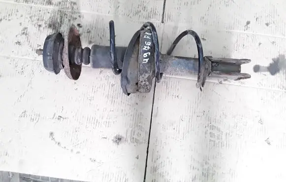 Renault Clio II Front shock absorber with coil spring 7706486