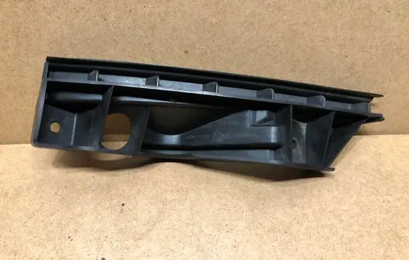 Volkswagen Touran I Front bumper mounting bracket 1T0807890A