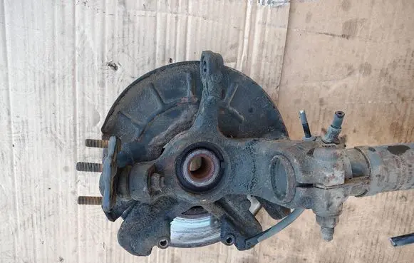 Front wheel hub spindle knuckle