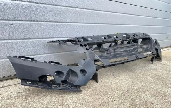 Front bumper mounting bracket