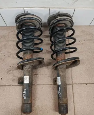 Peugeot 206+ Front shock absorber with coil spring