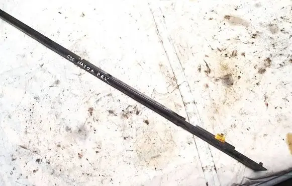 Mazda 626 Front door glass trim molding 