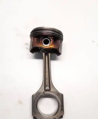 Piston with connecting rod
